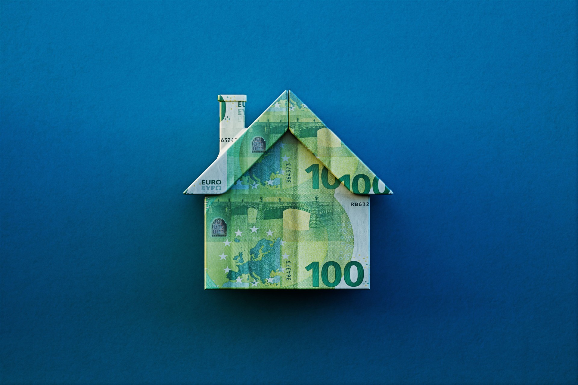 House Object Textured With 100 Euro Note On Blue Background